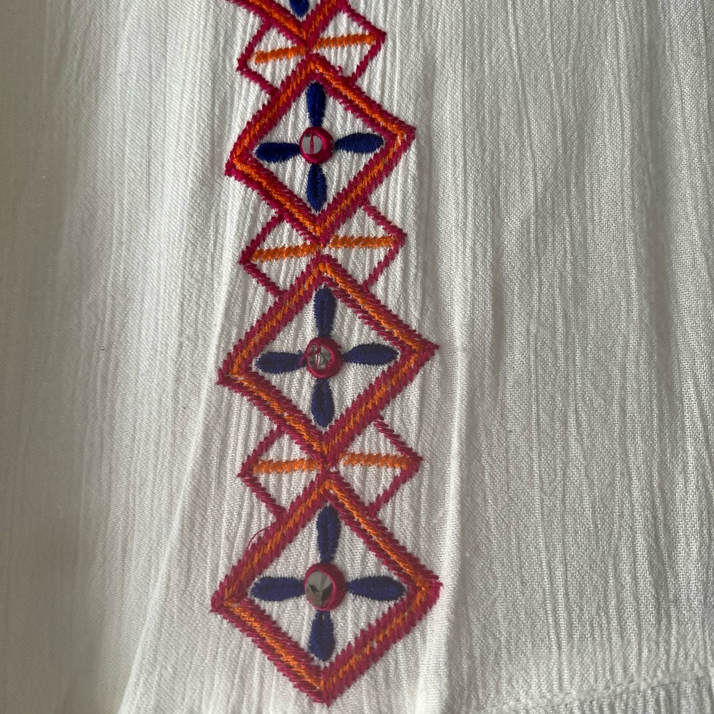 A. F. Fashion white gauze dress size large with some geometric decor. - Picture 13 of 13